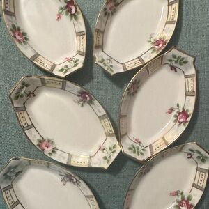 White and Green Porcelain Serveware likely salt 
Servers